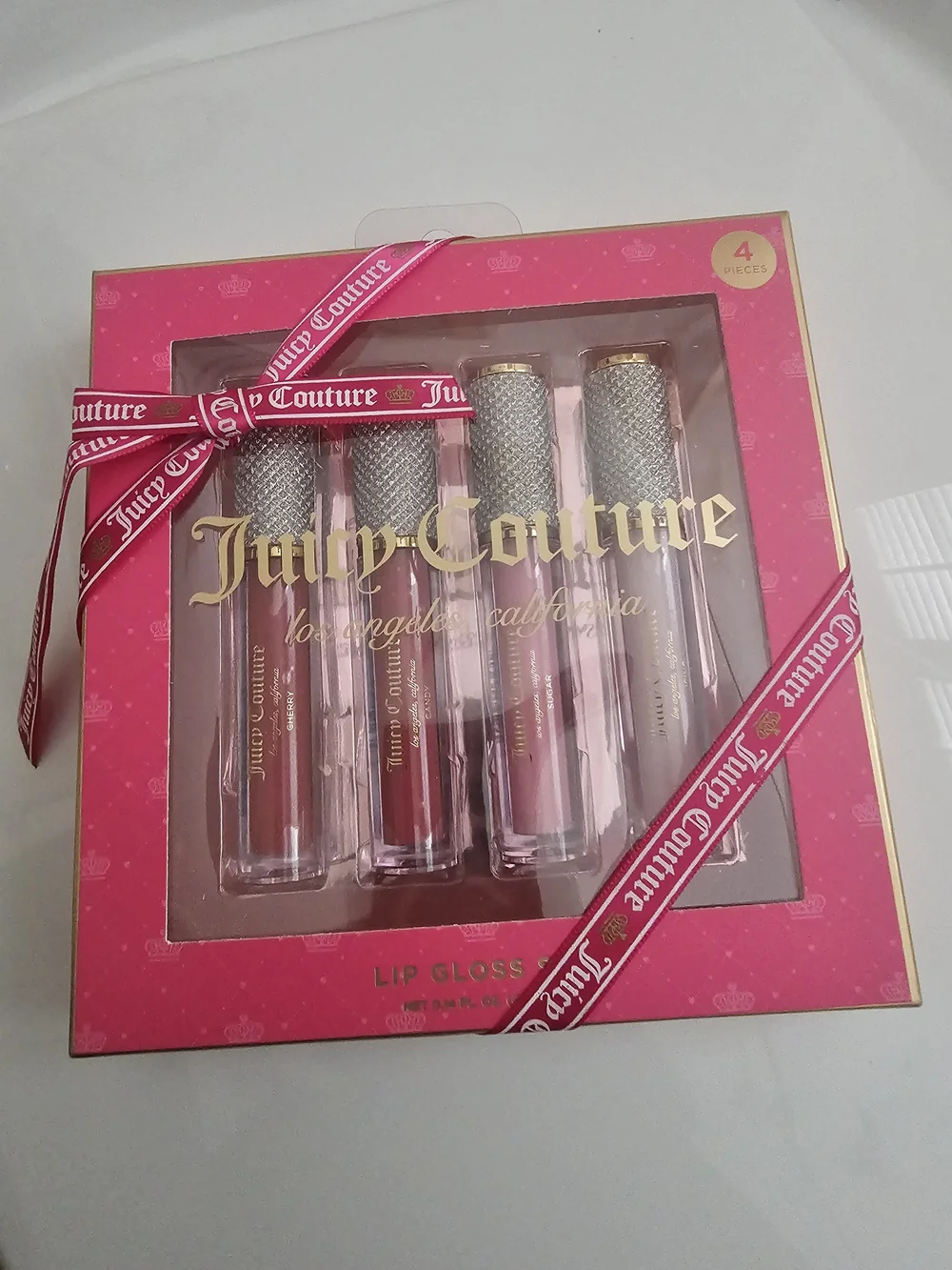 Juicy Couture 4-Piece Lip Gloss Set - Pink, Rose, Nude, Mauve